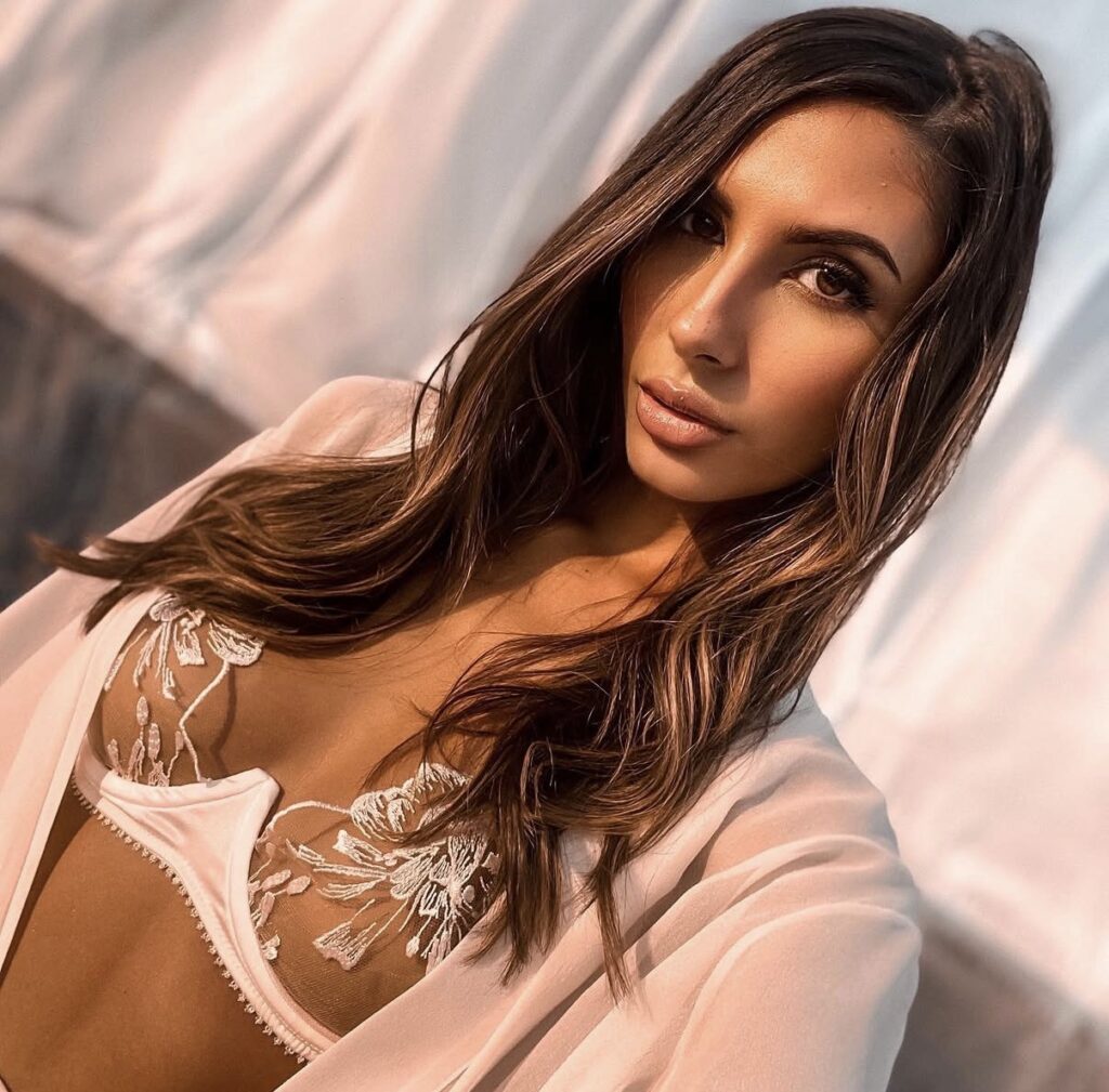 Gianna Dior elegant brunette glamour portrait with soft luxury lighting aesthetic