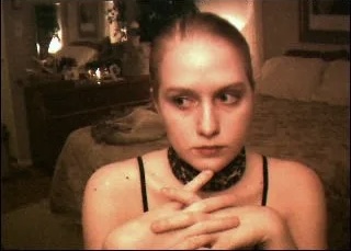 Jennifer Ringley dramatic webcam portrait with vintage online streaming vibe