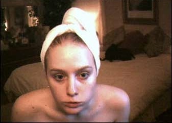Jennifer Ringley towel portrait with vintage webcam era aesthetic