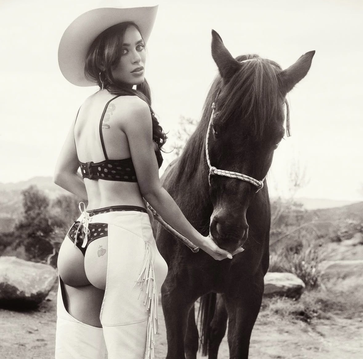 Lana Rhoades western horseback portrait with luxury influencer vibe
