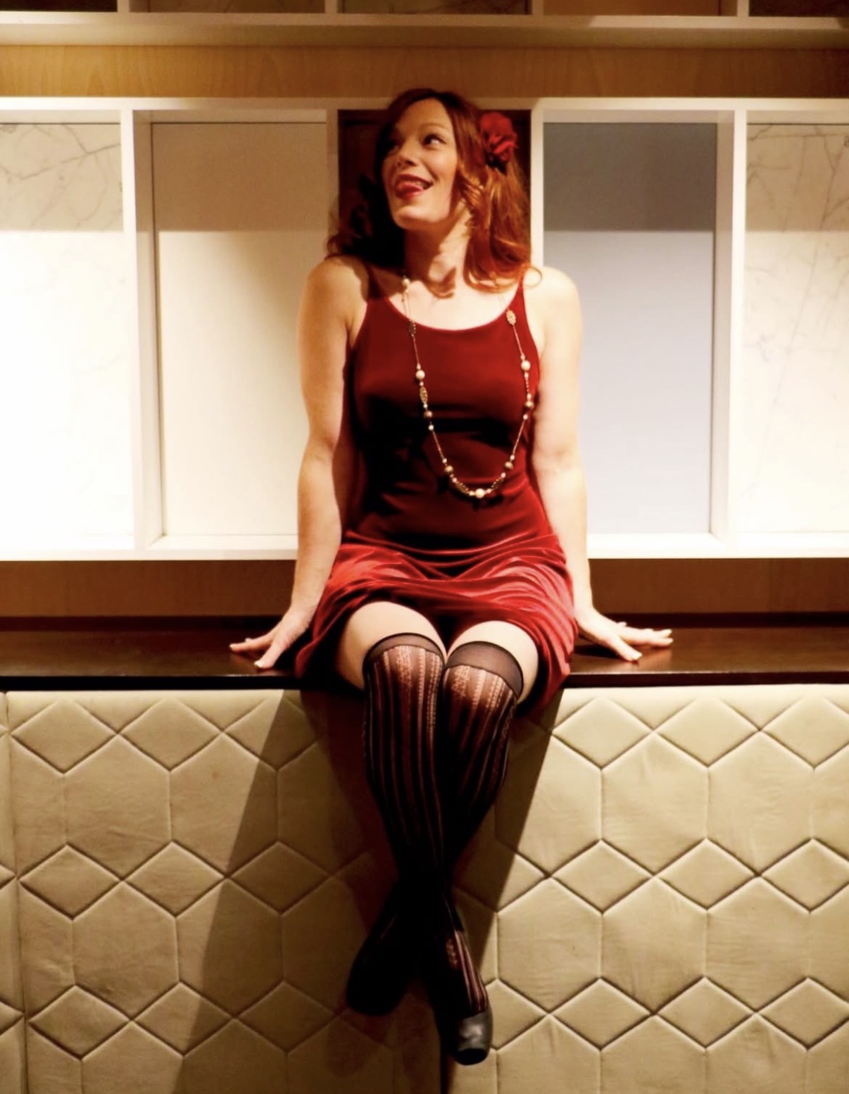 LittleRedBunny red velvet dress portrait with glamorous redhead influencer style