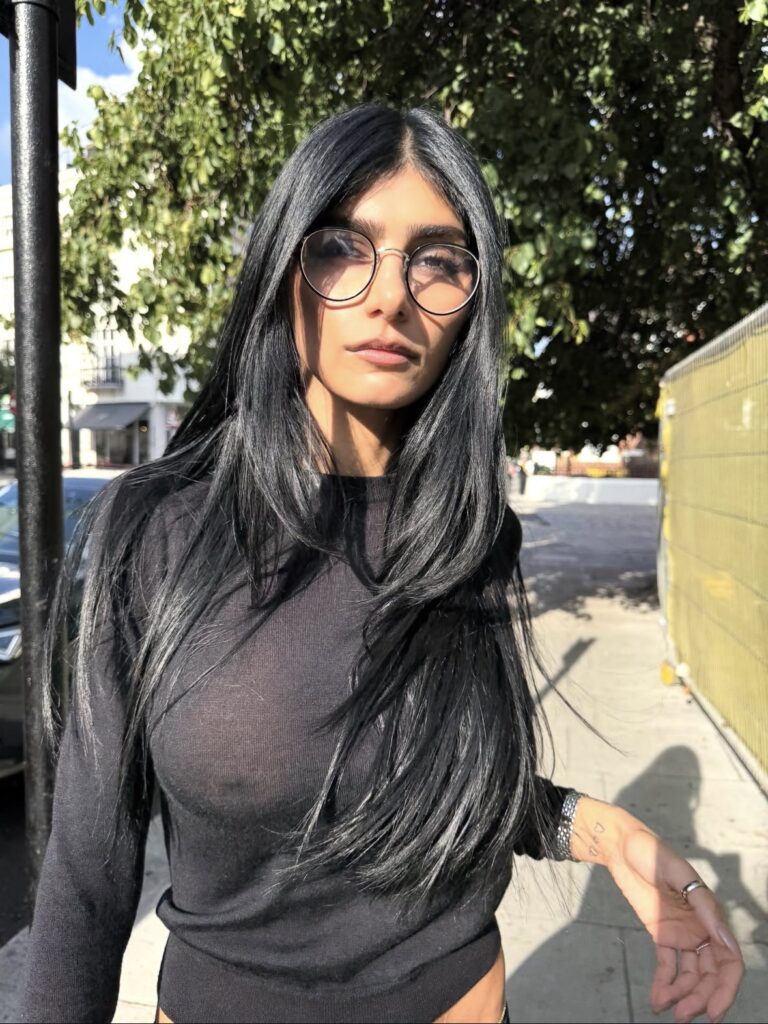 Mia Khalifa glasses fashion portrait with brunette influencer style