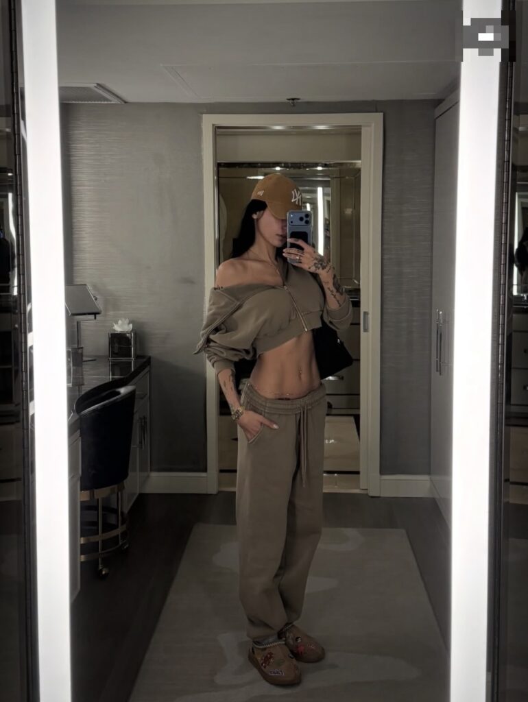 Mia Khalifa casual mirror selfie with brunette influencer style