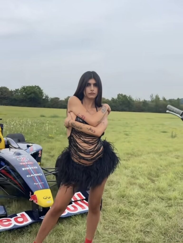 Mia Khalifa outdoor glamour portrait with luxury brunette influencer aesthetic