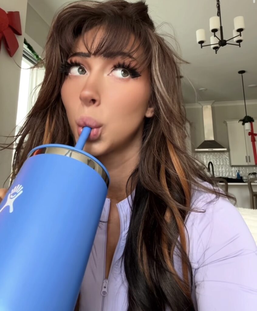 Nala Ray casual drink selfie with glamorous influencer style