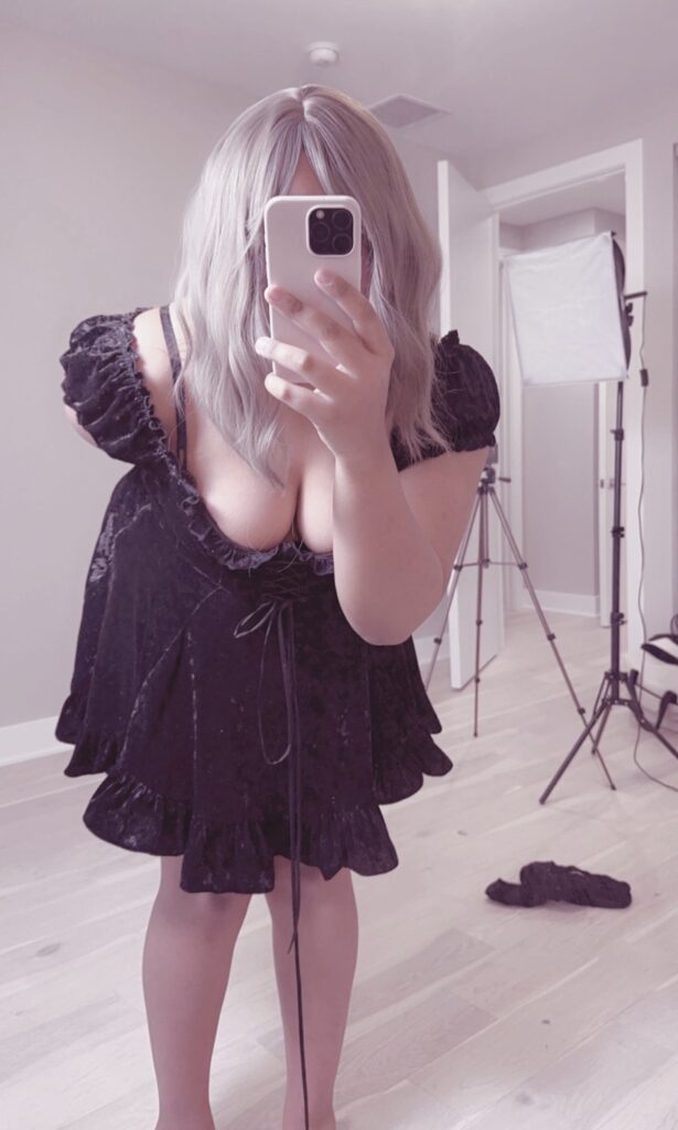 Nyannie kawaii fashion creator mirror selfie in dark aesthetic dress